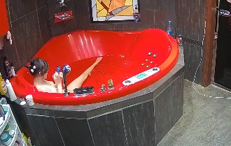 Girls having sexy fun in evening jacuzzi, March 27